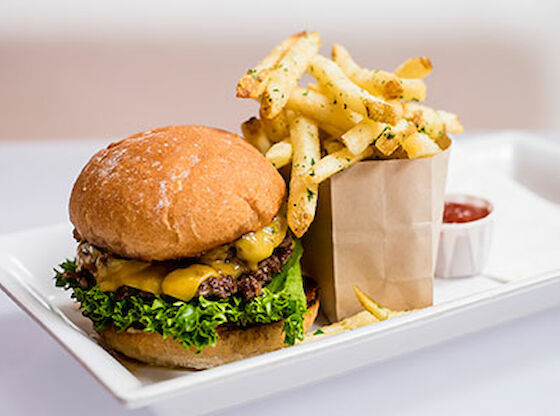 A burger and fries on a plate